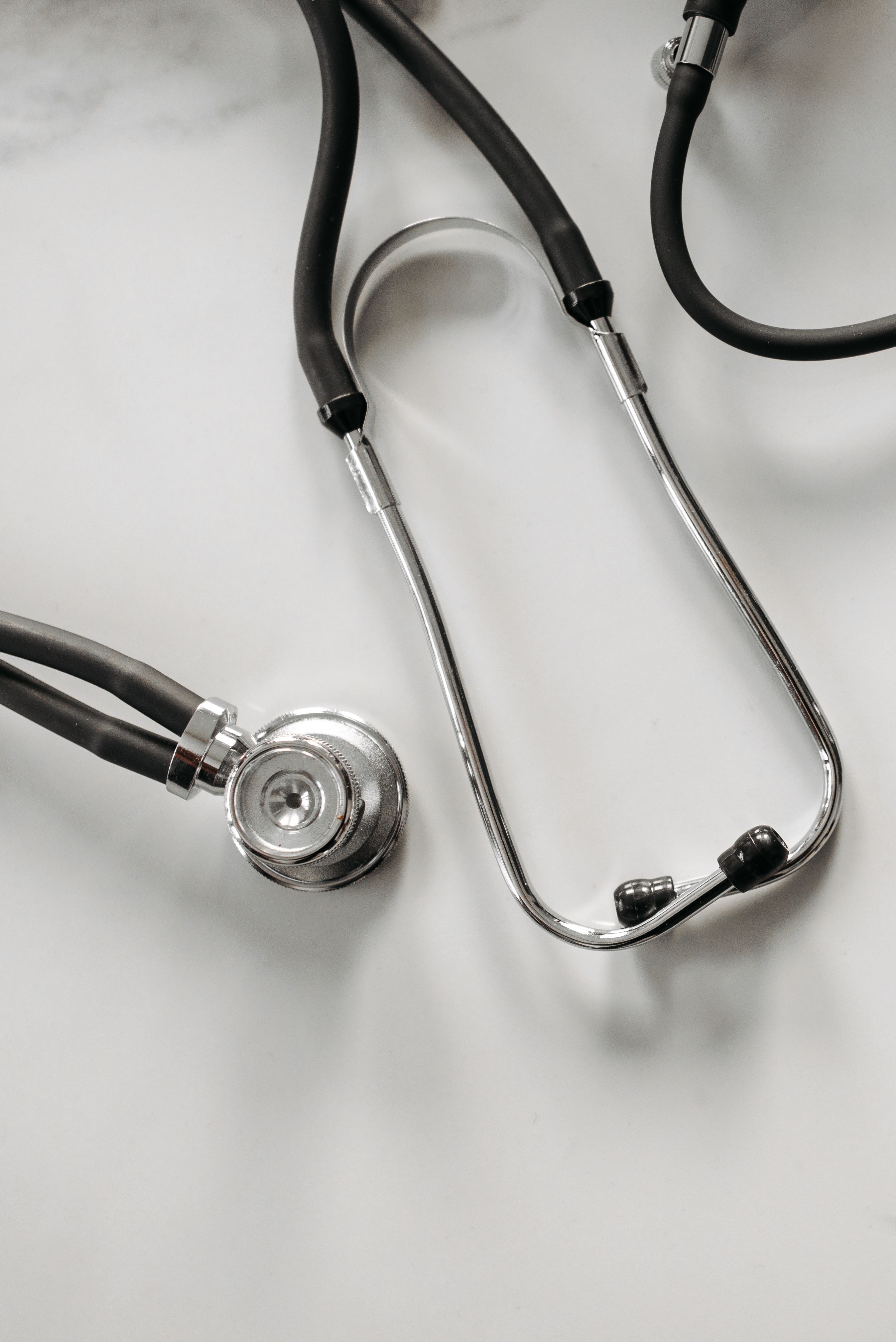 Minimalist close-up of a professional medical stethoscope
